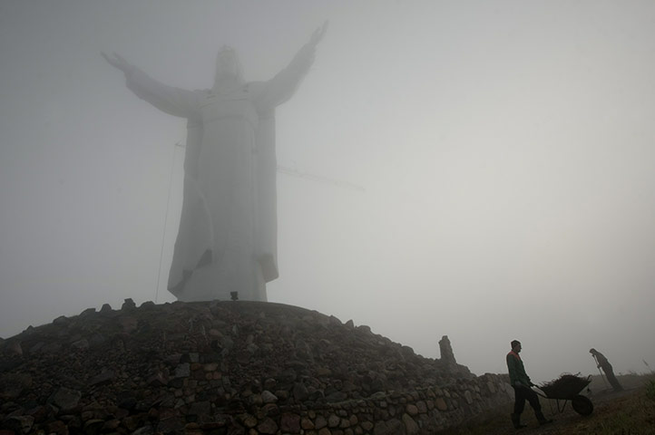 24 hours in pictures: statue of jesus  in poland