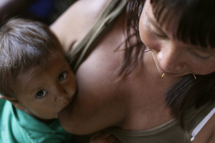 From the agencies: A woman from the Yanomamy tribe breastfeeds in Santa Isabel do Rio Negro