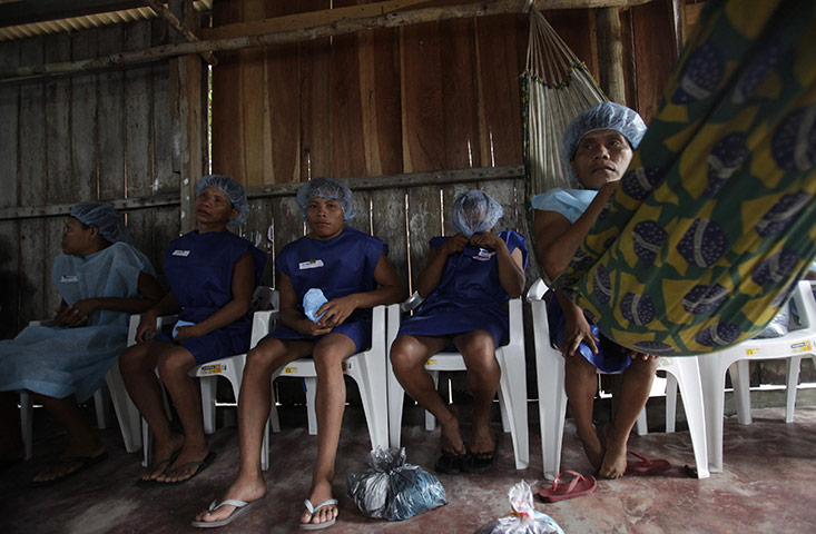 From the agencies: Men wait for their surgery in Santa Izabel do Rio Negro, northern Brazil