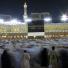 Hajj In Mecca: Muslim pilgrims moving around the Kaaba, the black cube Mecca