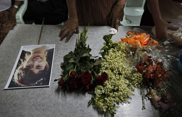 Suu Kyi Release: A portrait of Aung San Suu Kyi on a table in her political party office