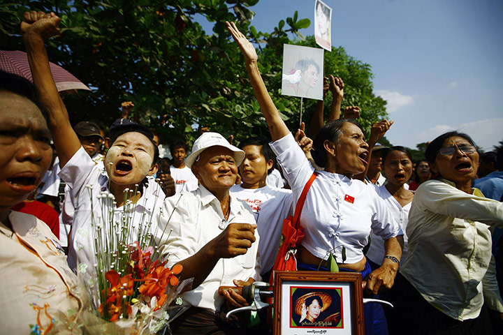 Suu Kyi Release: Supporters shout outside the house of Aung San Suu Kyi in Yangon