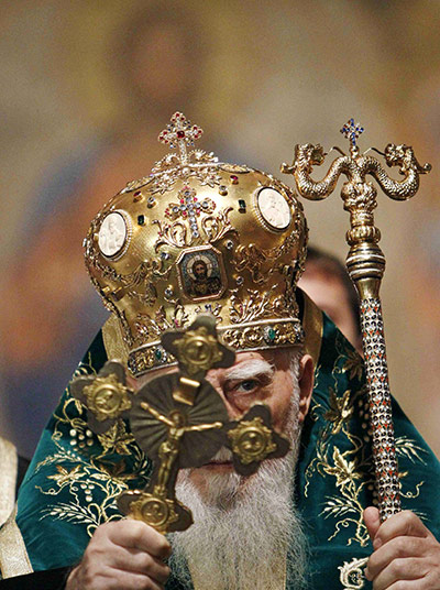 24 Hours: Patriarch Maxim holds a box with bones, believed to be of John the Baptist