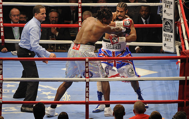 Haye v Harrison: David Haye and Audley Harrison fight it out in the 3rd round