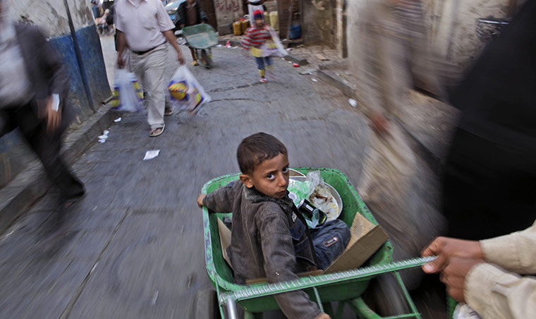 24 hours in pictures: boys play in Sana'a, Yemen