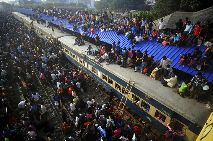Eid al-Adha: Thousands of Bangladeshis cram onto trains at the Airport Railway Terminal 