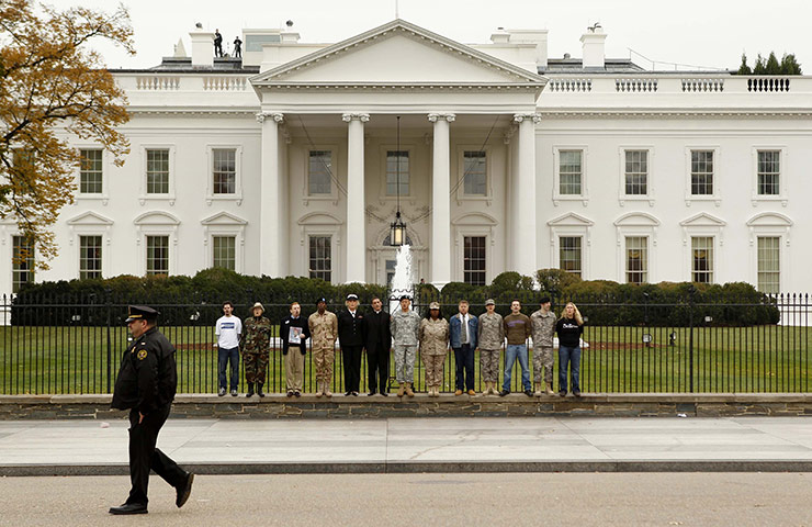 24 hours in pictures: Gay former members of the US armed forces in Washington