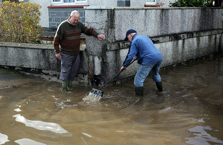 cornwall flooding update: Residents try to clear flood water in  St Blazey