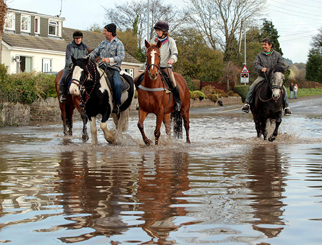 cornwall flooding update: Residents get about on horseback to avoid flooded streetsin St Blazey