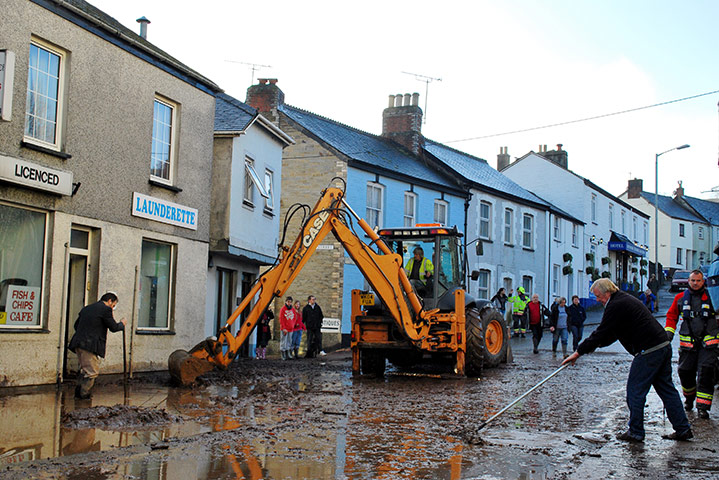 cornwall flooding update: Clear up operation on the A390 main road through Lostwithiel