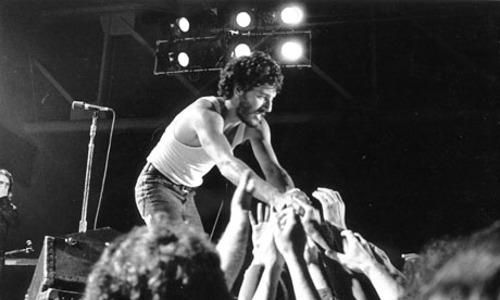 I'm your fan … Supplicants to a bearded Boss reach for his blessing in 1975. Photograph: Chris Walter/WireImage