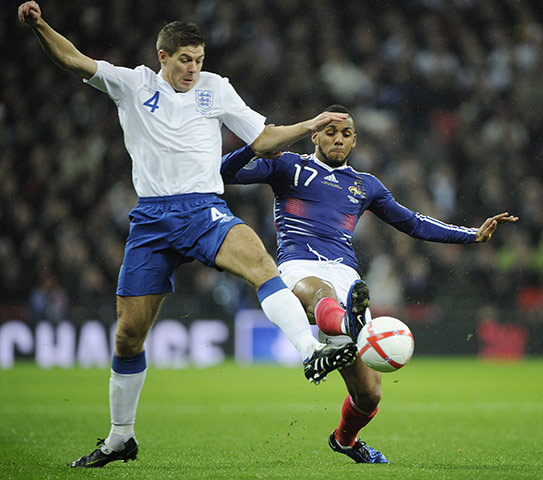 England v France: Gerrard and M'Vila tussle for the ball