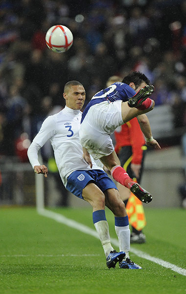 England v France: Valbuena tries an acrobatic back-flick in front of Gibbs