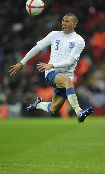 England v France: Kieran Gibbs acrobatically controls the ball