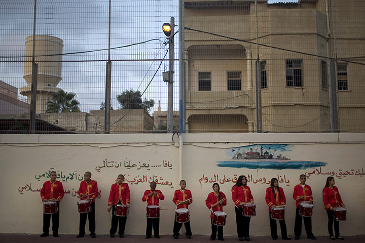 Eid al-Adha: A band of Arab Israeli youths wait to join a parade