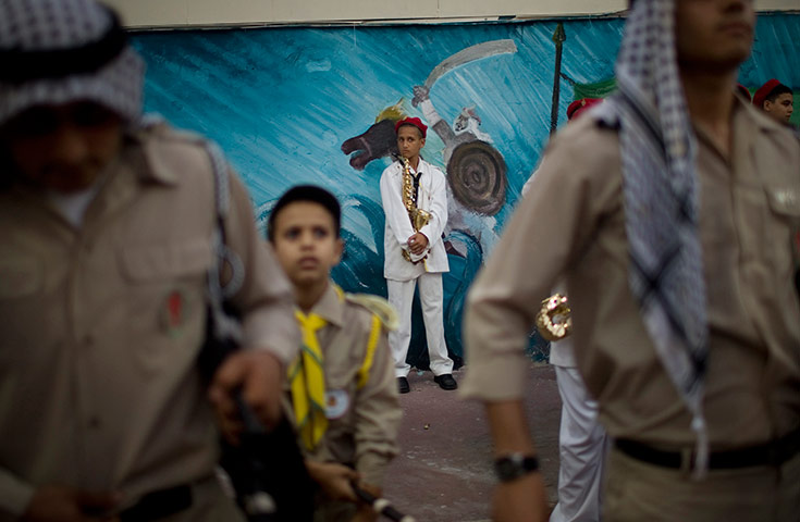 24 hours in pictures: Arab Israeli youths, from the scouts youth movement in a parade