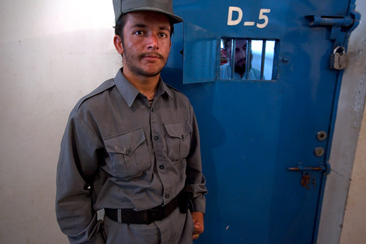 Sean Smith in Lashkar Gah: Alleged Taliban prisoners and their guards in Lashkar Gah prison