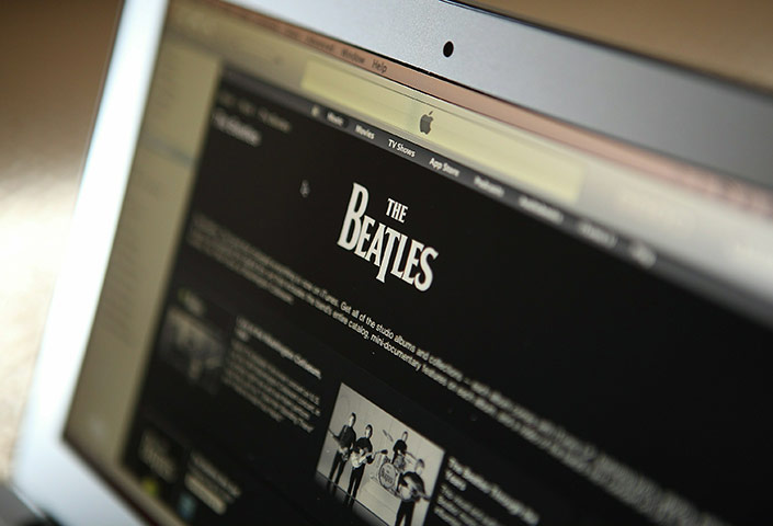 Week in Business: The Beatles catalogue is displayed on Apple's iTunes