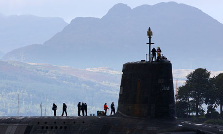 A Vanguard class nuclear submarine leaves Faslane naval base in Scotland