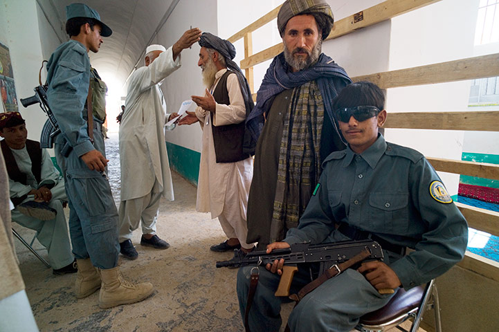Lashkar Gah Afghanistan: The district Judge and his prosecution staff at Nadi Ali