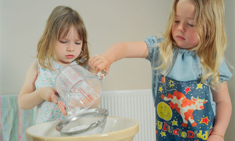 Children making cake