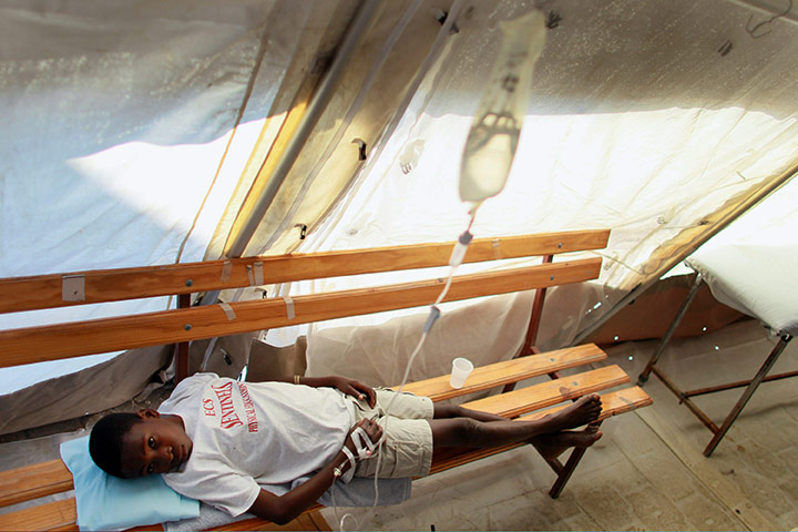 24 hours in pics: A cholera patient is treated in Saint-Nicolas hospital, Haiti