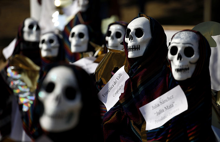 All Saints: Mexico City, Mexico: Figures with skull masks