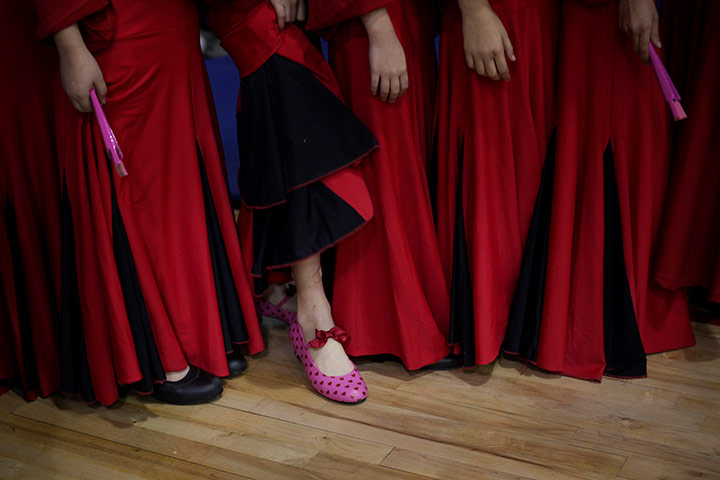 24 hours pics: Israeli girls wait to perform at halftime during a basketball game, Israel