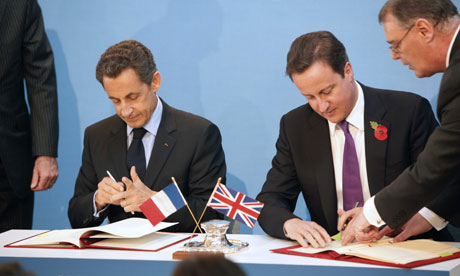 Cameron and Sarkozy signing defence agreement