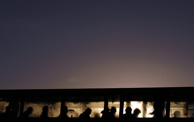 24 Hours: Commuters board a bus early in the morning near Howth in Dublin