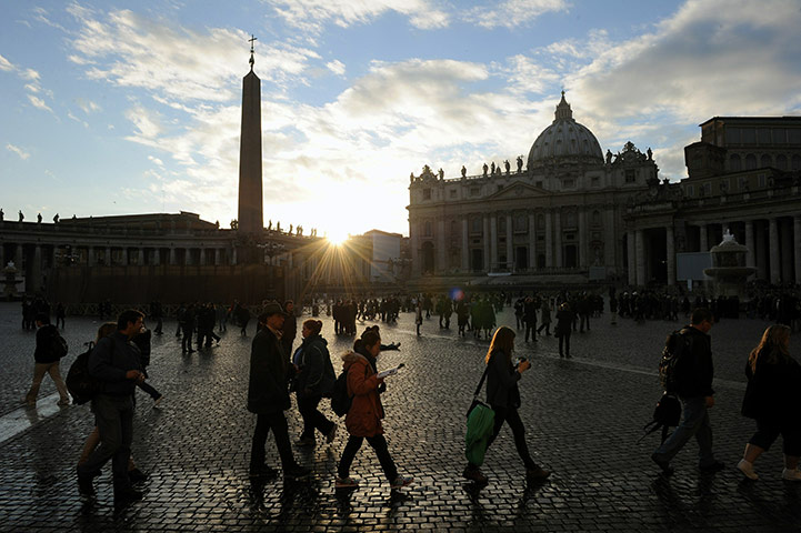 24 hours: Vatican City: Tourists walk in St Peter's square