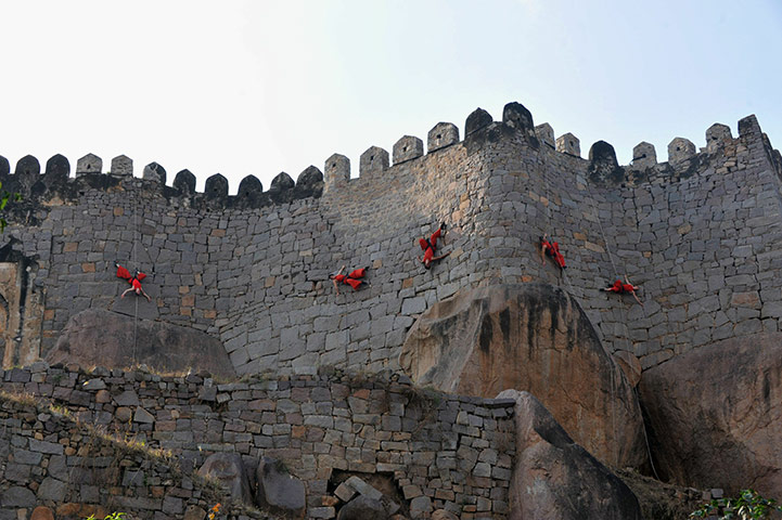 24 hours: Hyderabad, India: Members of Project Bandaloop perform aerial dances