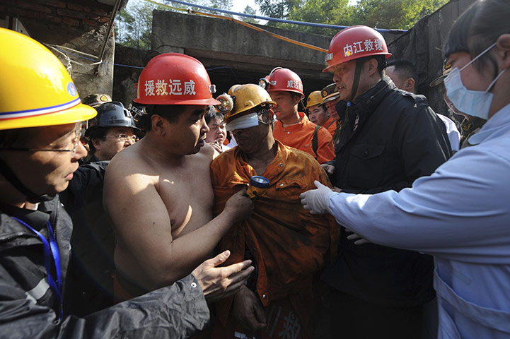 China's trapped miners: Liu Mingquan, a trapped miner, is rescued at Batian Coal Mine