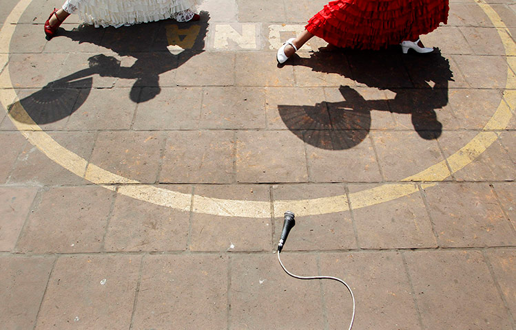 24 hours in pictures: Flamenco dancers in Lima