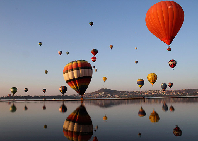 24 hours in pictures: Hot air balloons participate in the Hot Air Balloons Festival in Leon