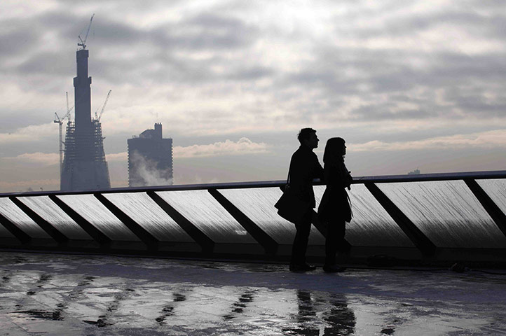 Tall buildings: Construction takes place on The Shard building (at rear)