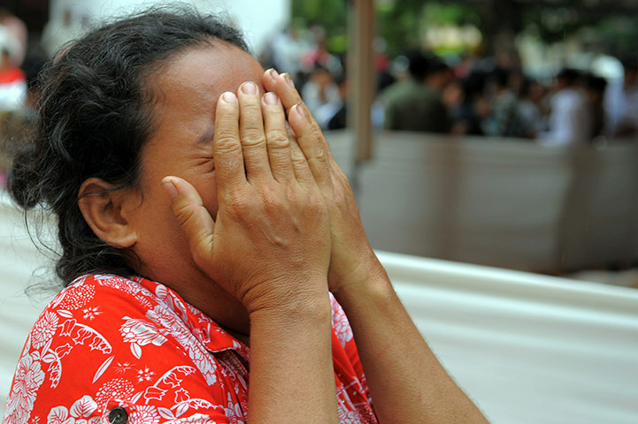 Cambodian stampeded: A Cambodian woman cries after finding her son