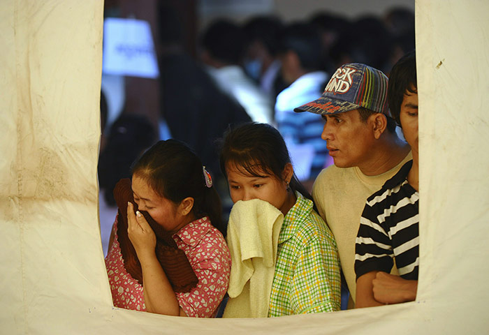 Cambodian stampeded: Families look for their loved ones among