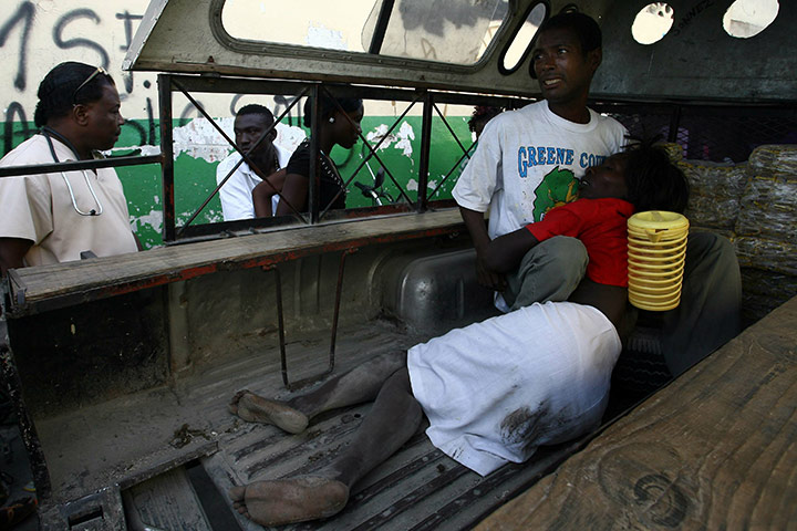 Haiti Cholera: A woman suffering from cholera in Cite Soleil Port-au-Prince