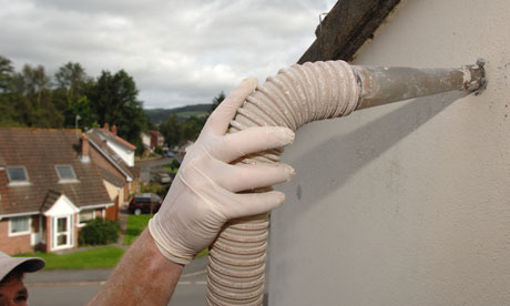 Installing cavity wall insulation, one of the benefits of householders signing up to the green deal