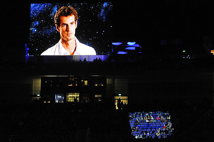 Murray v Federer: A quite scary looking Andy Murray stares down from the big screen