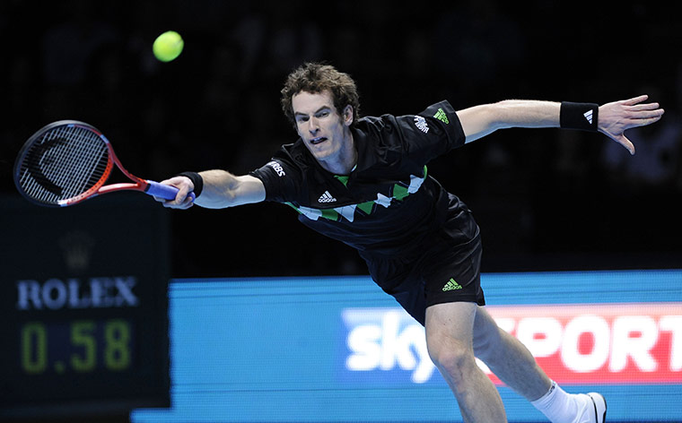 Murray v Federer: Andy Murray struggles to reach a serve