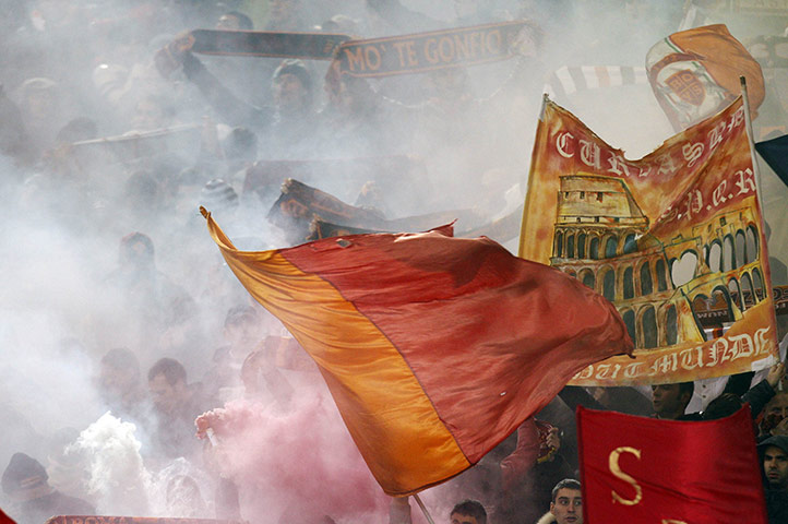 Champions League Tuesday: AS Roma fans wave flags at the Champions League match against Bayern Munich