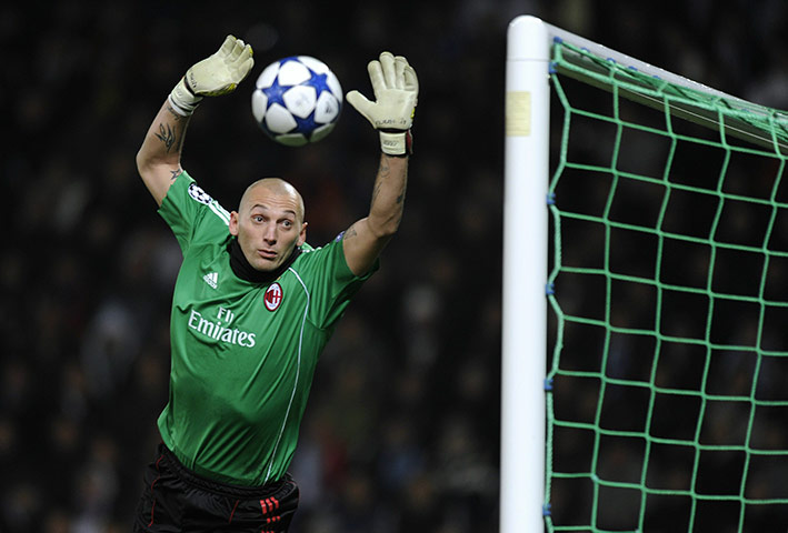 Champions League Tuesday: Milan's Abbiati watches the ball during their victory over Auxerre