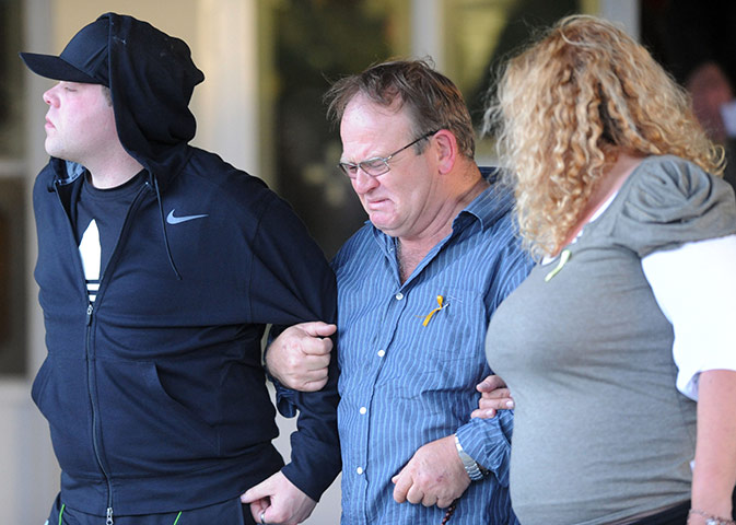 NZ miners: Family members leave a candlelight vigil after a second explosion
