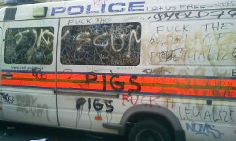 The police van that was stranded in the middle of the kettle of student protesters in London.