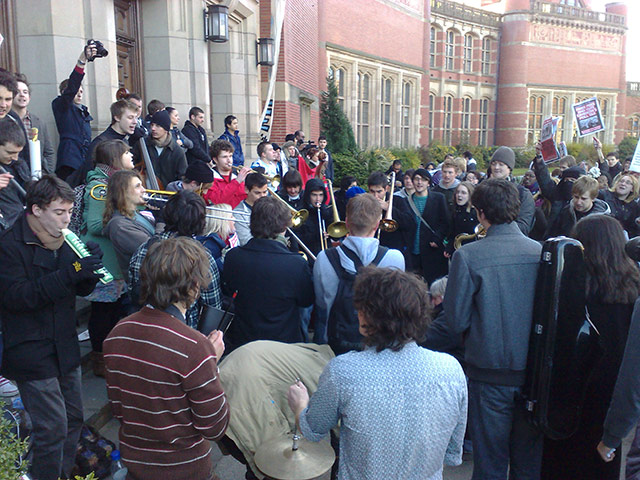 Pictures by students: Students play musical instruments at the Aston Webb building 