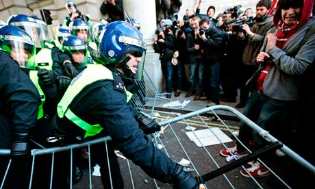 Police clash with students in London during a demonstration over tuition fees