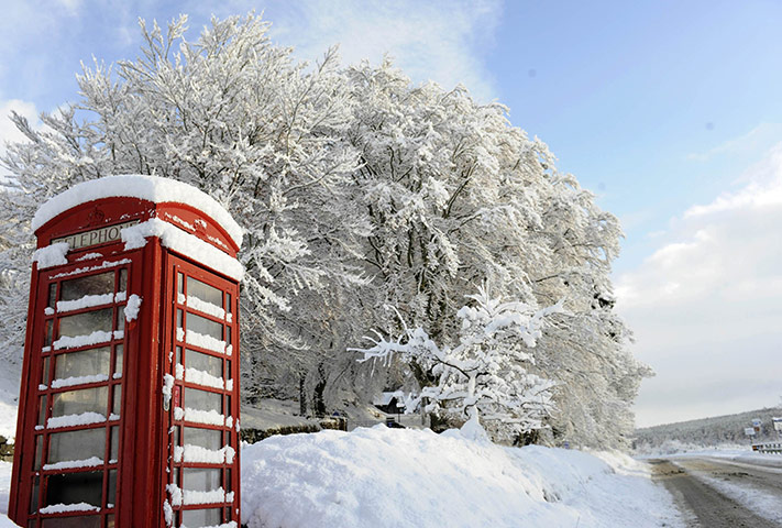 Snow: Snow covers a telephone box in Crathie in Scotland