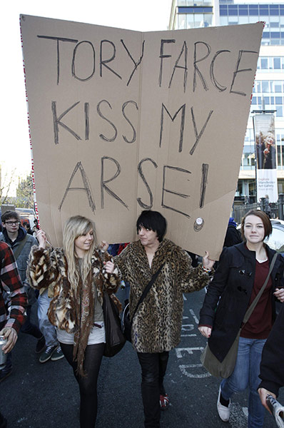 Student Protest Slogans : Protesters march during a demonstration in Manchester
